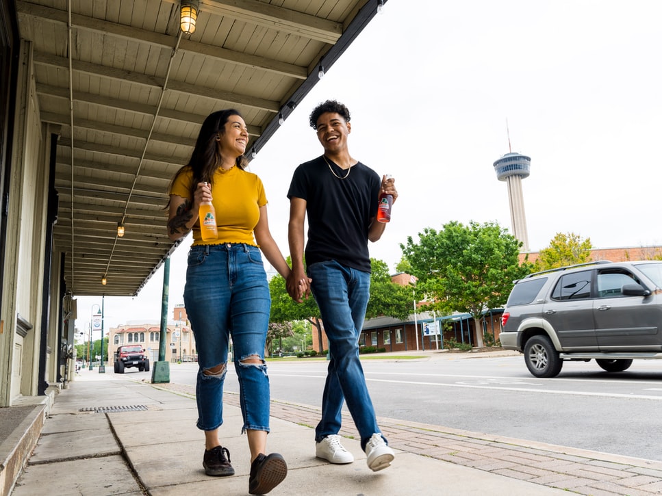 couple walking in downtown san antonio for a marketing conference